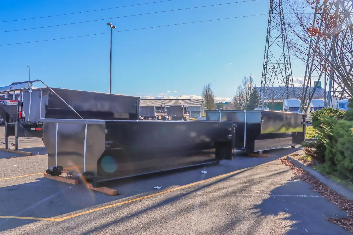 Roll-off dumpster ready for waste disposal at job site for Commercial Dumpster Rental in Sutton